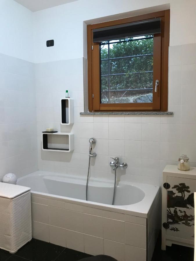Armonie Del Lago - Lakeview Retreat With Private Garden, Pool & Jacuzzi Baveno Quarto foto